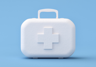 A white first aid kit with a handle and a white medical cross against a light blue background.